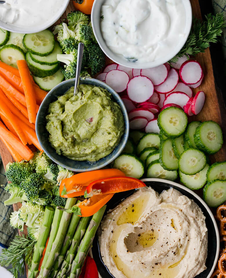 Crudite platter featuring fresh veggies, pretzels and dips.