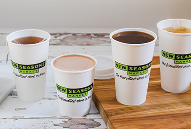 Four different drinks from new Seasons' beverage bar arranged on a counter