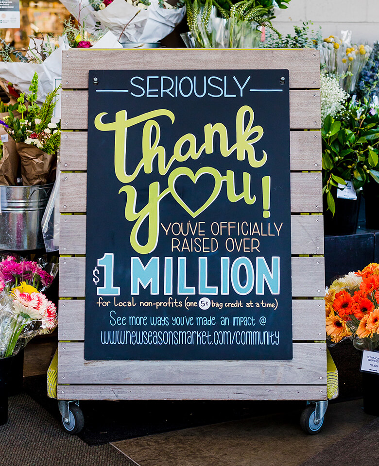 Chalk sign thanking customers for their donations.