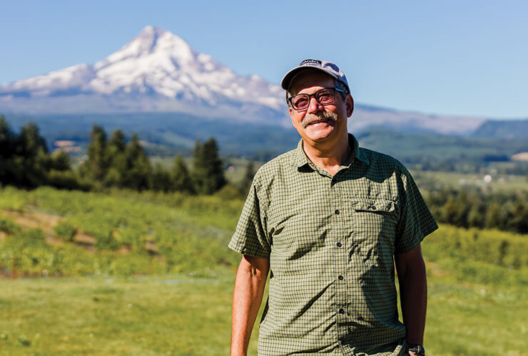 Image of Sal D’Auria from Cinagro Orchards in his Oregon orchard.