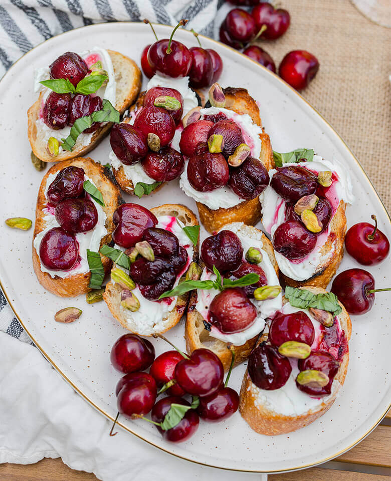 a photo of the recipe for grilled crostini with goast cheese and cherry compote