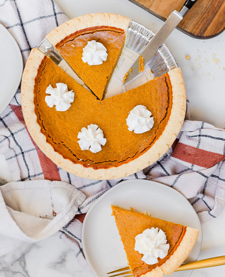 pumpkin pies on a counter