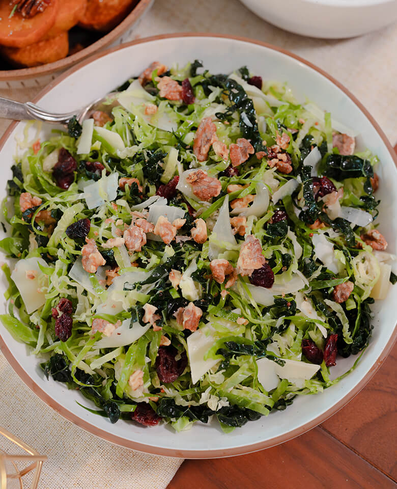 a bowl of salad on a table top